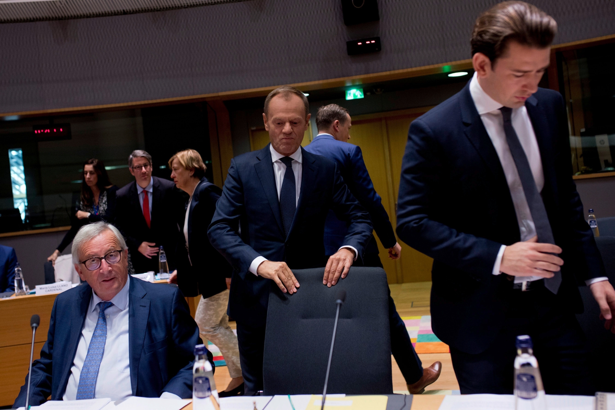 European Commission President Jean-Claude Juncker, European Council President Donald Tusk and Austria's Chancellor Sebastian Kurz, from left, arrive to a Tripartite Social Summit roundtable at the European Council headquarters in Brussels, Tuesday, Oct. 16, 2018. (AP Photo/Francisco Seco) Belgium Brexit