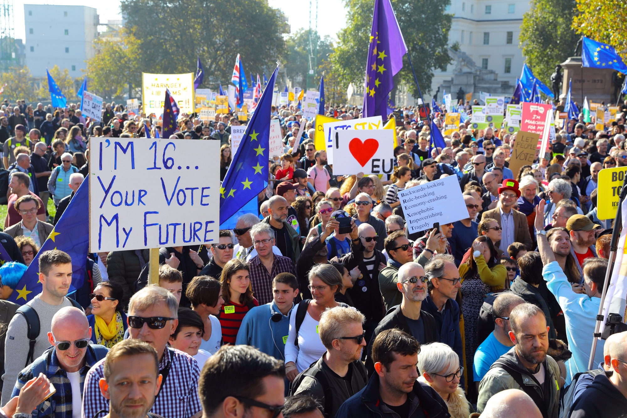 epaselect epa07106809 Demonstrators with banners during the People's Vote March for the Future in London, Britain, 20 October 2018. Reports state that the 'March for the Future' is to be led by a column of young people and call for a PeopleÄôs Vote on the Brexit deal. After marching through central London, there will be a rally on stage in Parliament Square, including speeches from Mayor of London Sadiq Khan.  EPA/VICKIE FLORES epaselect BRITAIN BREXIT PEOPLES MARCH