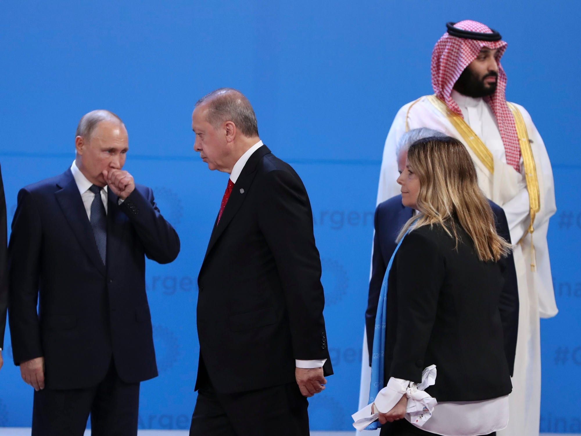 Russia's President Vladimir Putin, left, Turkey's President Recep Tayyip Erdogan, second from left, and Saudi Arabia's Crown Prince Mohammed bin Salman, right, arrive for the family photo of the G20 Leader's Summit at the Costa Salguero Center in Buenos Aires, Argentina, Friday, Nov. 30, 2018. (AP Photo/Ricardo Mazalan) Argentina G20 Summit