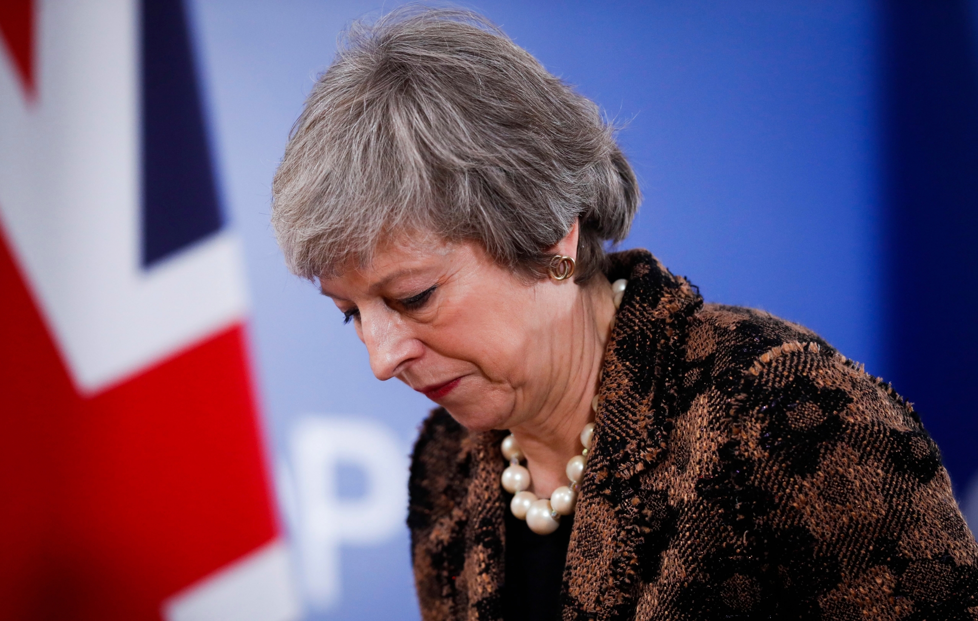 epa07230986 British Prime Minister Theresa May arrives to give a news conference at the end of the summit of EU leader in Brussels, Belgium, 14 December 2018. On the second day of summit EU leader again focussed on the conclusions on the Single Market, climate change, migration, disinformation, the fight against racism and xenophobia, and citizens' consultations.  EPA/OLIVIER HOSLET BELGIUM EU COUNCIL SUMMIT