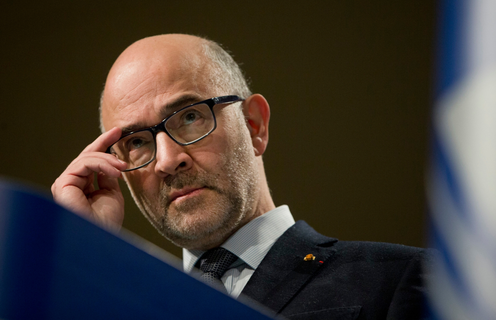 European Commissioner for Economic and Financial Affairs Pierre Moscovici pauses before speaking during a media conference at EU headquarters in Brussels, Wednesday, Dec. 19, 2018. The European Commission says it has reached an agreement with Italy to avert action over the country's budget plans, which the EU's executive arm had warned could break euro currency rules. (AP Photo/Virginia Mayo) Belgium EU Italy Budget