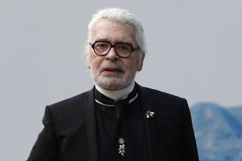 Fashion designer Karl Lagerfeld poses after the presentation of Chanel Spring/Summer 2019 ready-to-wear fashion collection in Paris, Tuesday, Oct.2, 2018. (AP Photo/Christophe Ena)