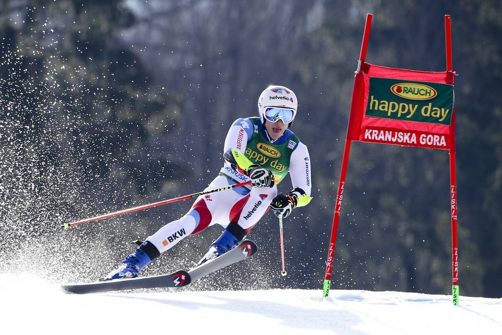 Switzerland's Marco Odermatt speeds down the course during an Alpine Skiing World Cup men's Giant Slalom, in Kranjska Gora, Slovenia, Saturday, March. 9, 2019. (AP Photo/Marco Trovati)