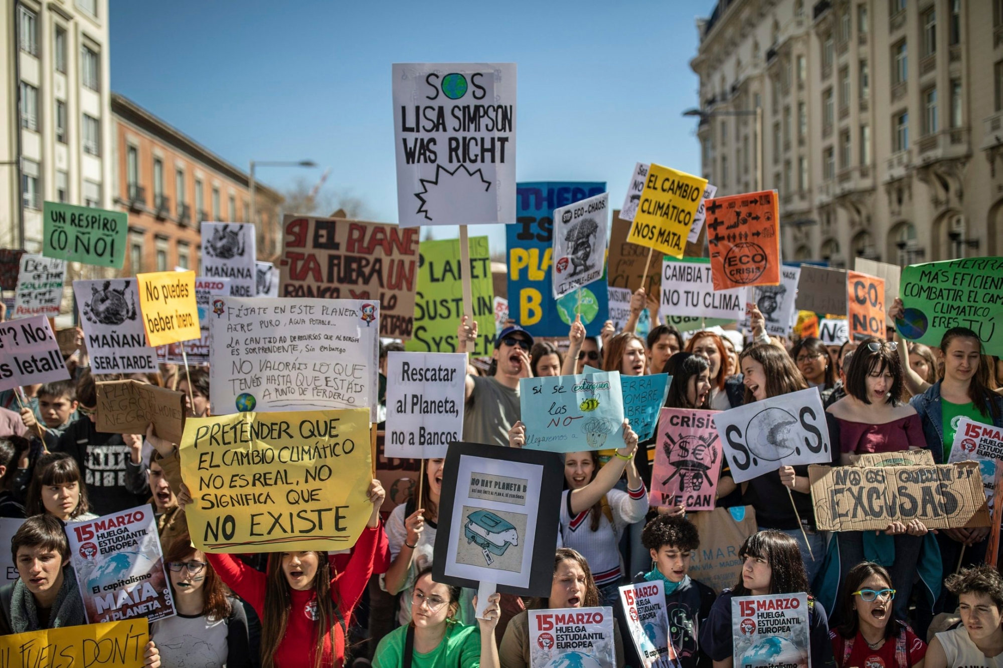 Students hold pro-environment banners during a rally in Madrid, Spain, Friday March 15, 2019. Students mobilized by word of mouth and social media skipped class Friday to protest what they believe are their governments' failure to take tough action against global warming. (AP Photo/Bernat Armangue) Spain Climate Student Protests
