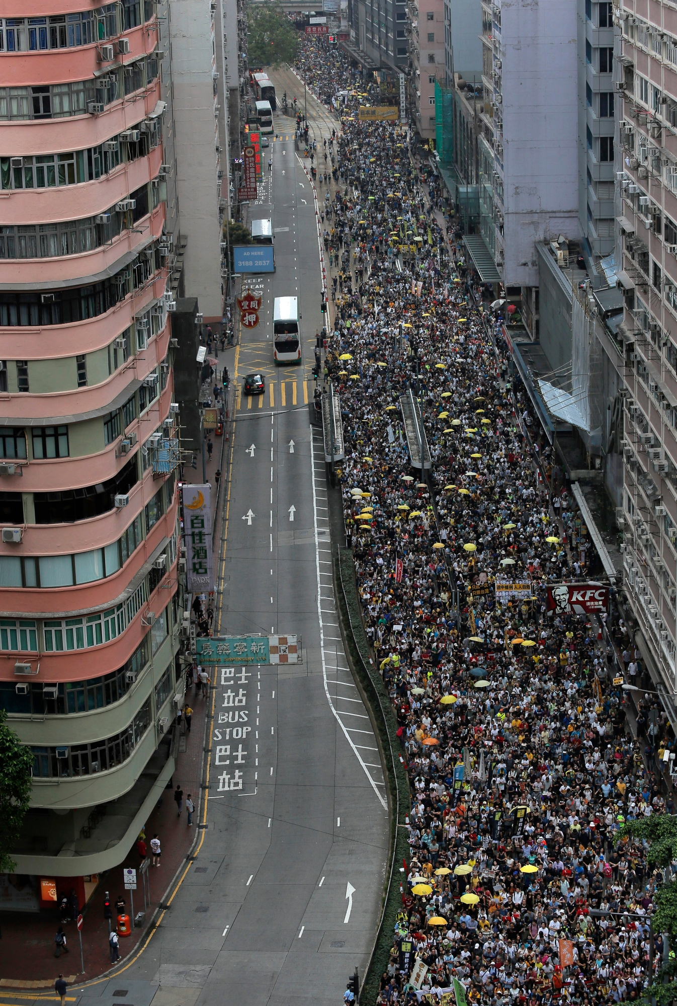 Protesters against an extradition law march along a downtown street in Hong Kong Sunday, April 28, 2019. Thousands of people protested to express their concerns about the proposed new extradition law that would make it possible for people to be sent to mainland China to face the justice system there. (AP Photo/Vincent Yu) Hong Kong China Extradition Law