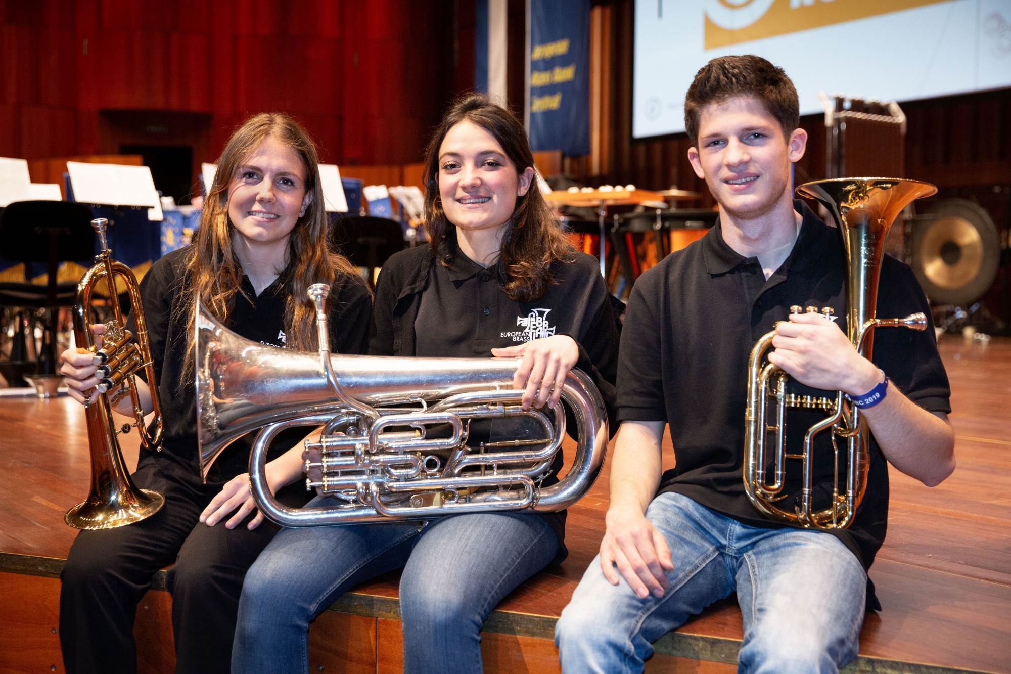 Adline Vouillamoz, Stéphanie Gaspoz et Jonathan Théry, trois Valaisans au sein du Brass Band européen des jeunes 2019.