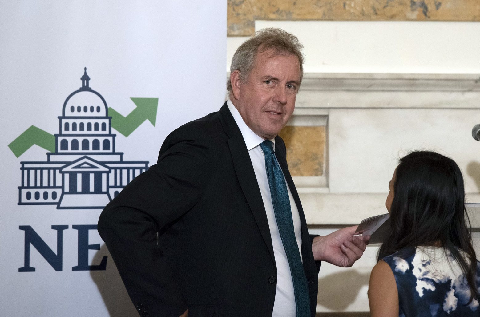 In this Friday, Oct. 20, 2017 photo, British Ambassador Kim Darroch hosts a National Economists Club event at the British Embassy in Washington. Leaked diplomatic cables published Sunday, July 7,2 019, in a British newspaper reveal that Britain's ambassador to the United States described President Donald Trump's administration as "clumsy and inept" while grappling with international problems.   (AP Photo/Sait Serkan Gurbuz) Britain-Trump