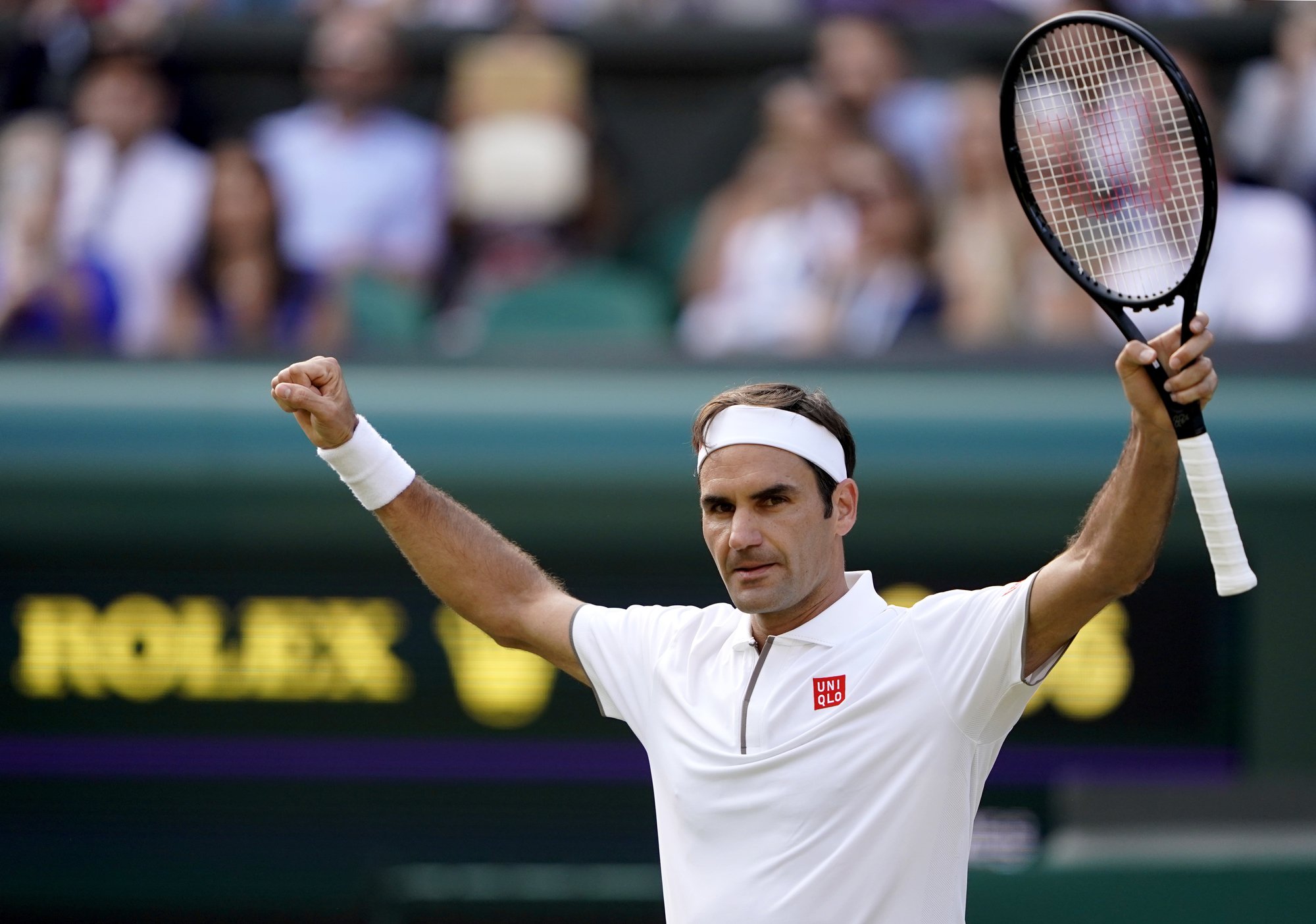 epa07708449 Roger Federer of Switzerland celebrates winning against Kei Nishikori of Japan during their quarter final match for the Wimbledon Championships at the All England Lawn Tennis Club, in London, Britain, 10 July 2019. EPA/NIC BOTHMA EDITORIAL USE ONLY/NO COMMERCIAL SALES