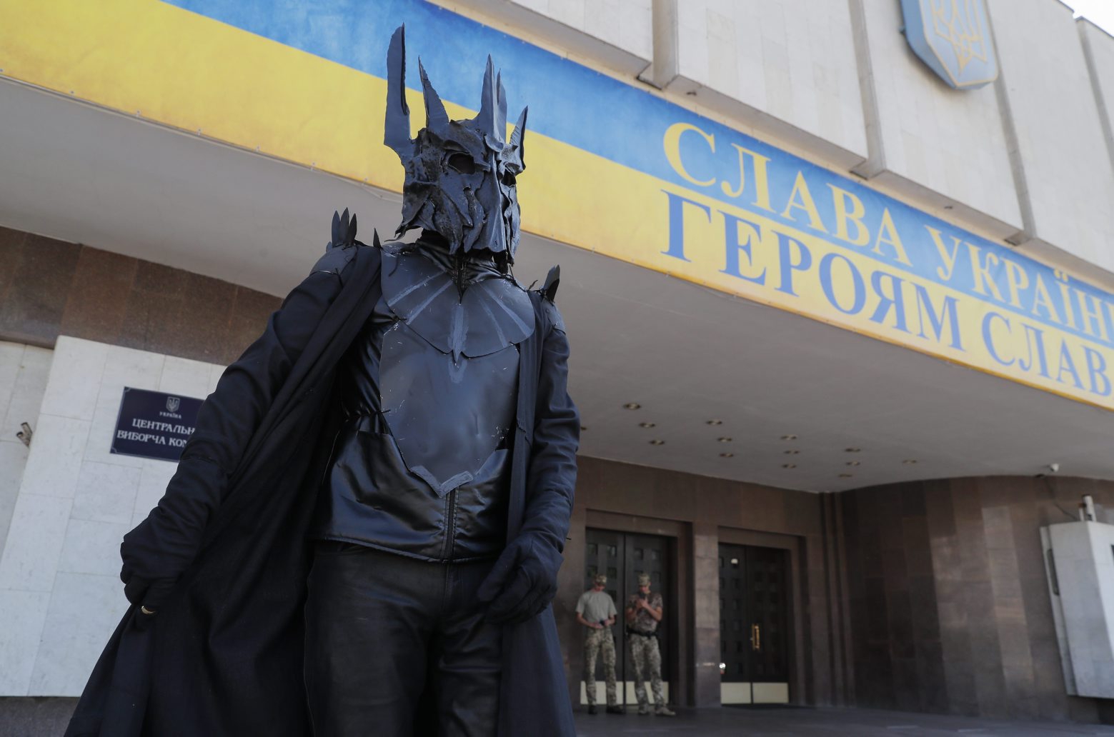 epaselect epa07726548 An activist dressed like Sauron, the malevolent character of the Tolkien saga ?Lord of the rings? and symbolized the malevolent forces activity before elections, performs in front of Central Election Committee in Kiev, Ukraine, 19 July 2019. Elections will be held on 21 July 2019 after President Volodymyr Zelensky dissolved parliament during his inauguration on 21 May 2019.  EPA/SERGEY DOLZHENKO epaselect UKRAINE PARLIAMENT ELECTIONS