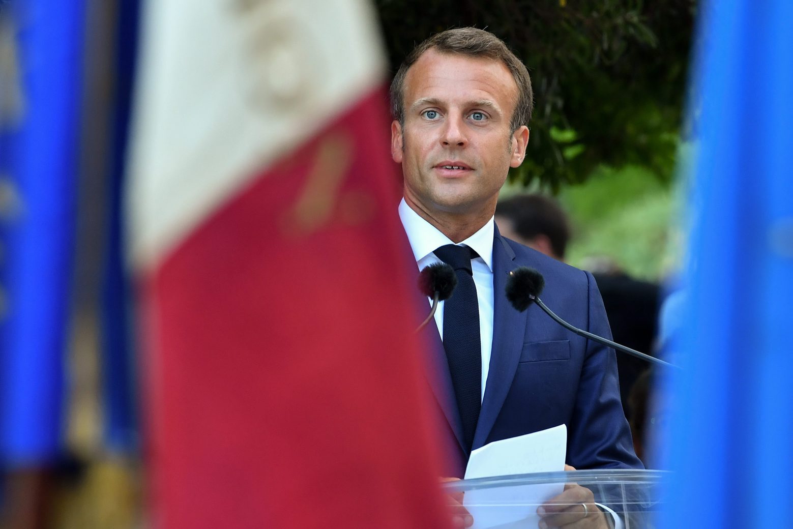 epa07778292 French President Emmanuel Macron delivers a speech during a ceremony marking the 75th anniversary of the Allied landings in Provence in World War II which helped liberate southern France, in Bormes-les-Mimosas, France, 17 August 2019.  EPA/YANN COATSALIOU / POOL  MAXPPP OUT FRANCE HISTORY WWII PROVENCE ANNIVERSARY