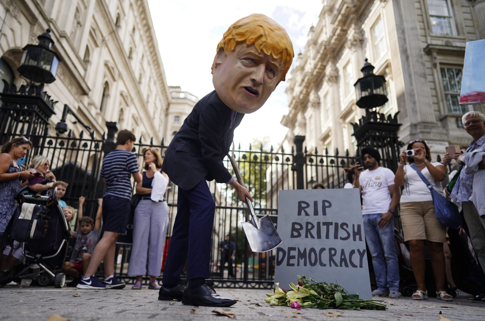 epa07799379 A protester depicting British Prime Minister Boris Johnson demonstrates during a protest outside the gates of Number 10 Downing Street in Westminster, London, Britain, 28 August 2019. The UK government is to suspend Parliament after the summer break, a move that might block MPs from voting against a possible no-deal Brexit. In a letter to legislators, British PM Boris Johnson said he had asked Queen Elizabeth II to suspend the current parliamentary session in the second week of September until 14 October.  EPA/WILL OLIVER BRITAIN POLITICS BREXIT