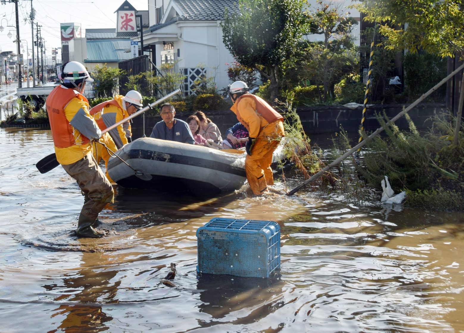 epa07917695 Rescue works are underway in flooded areas in Date, Fukushima prefecture, Japan, 13 October 2019. According to latest media reports, at least 26 people have died and more than 20 are missing after powerful typhoon Hagibis hit Japan provoking landslides and rivers overflowing  across the country.  EPA/JIJI PRESS JAPAN OUT EDITORIAL USE ONLY/  NO ARCHIVES  NO ARCHIVES  NO ARCHIVES JAPAN TYPHOON AFTERMATH