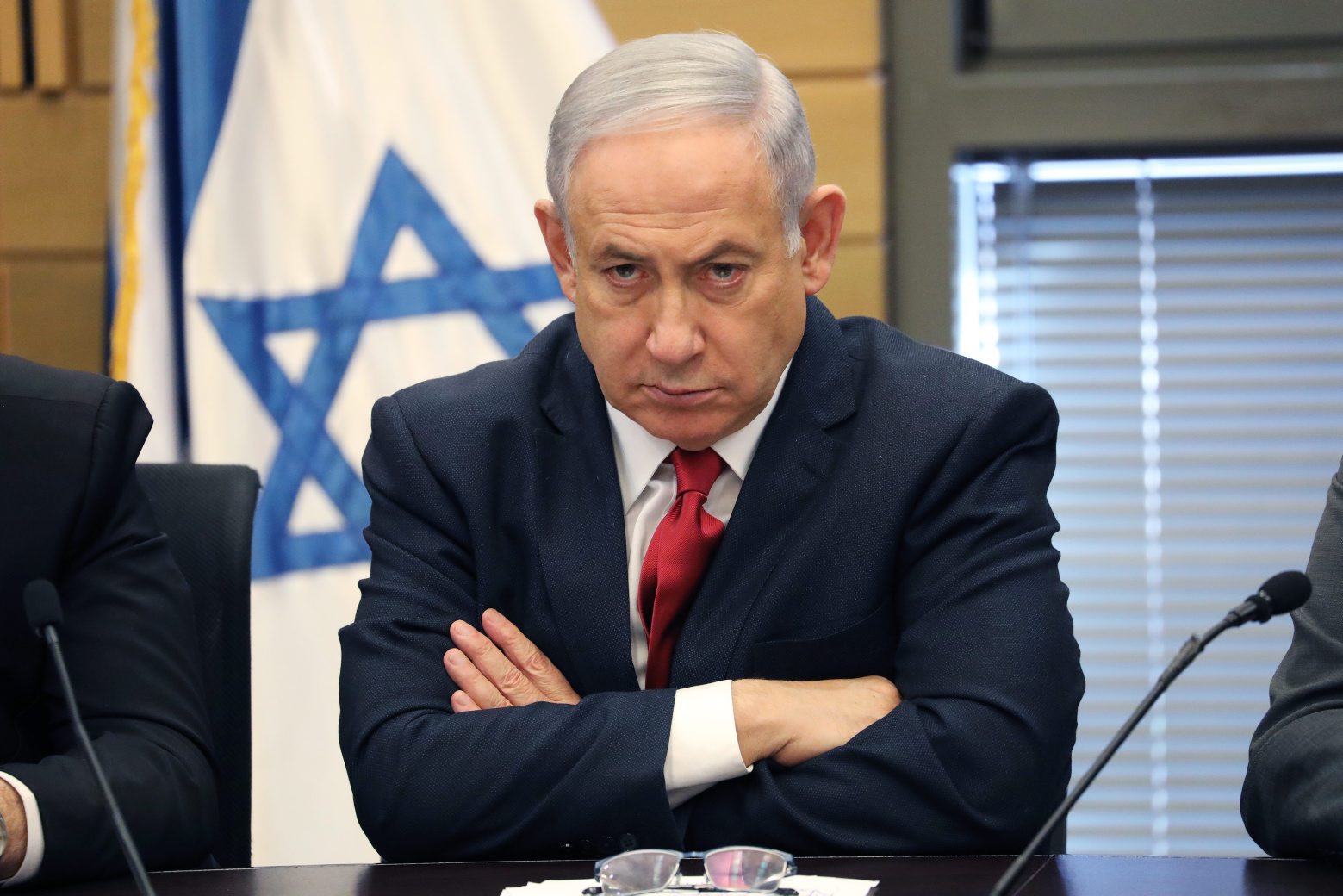 epa08014909 (FILE) - Israeli Prime Minister and leader of Likud Party Benjamin Netanyahu during an extended faction meeting of the right-wing bloc members at the Israeli Knesset (parliament) in Jerusalem, Israel, 18 November 2019 (reissued 21 November 2019). Reports on 21 November 2019 state Israeli Prime Minister Benjamin Netanyahu has officially been charged by the attorney general in a number of corruption scandals. Netanyahu was charged with bribery, breach of trust and fraud.  EPA/ABIR SULTAN (FILE) ISRAEL GOVERNMENT NETANYAHU INDICTED