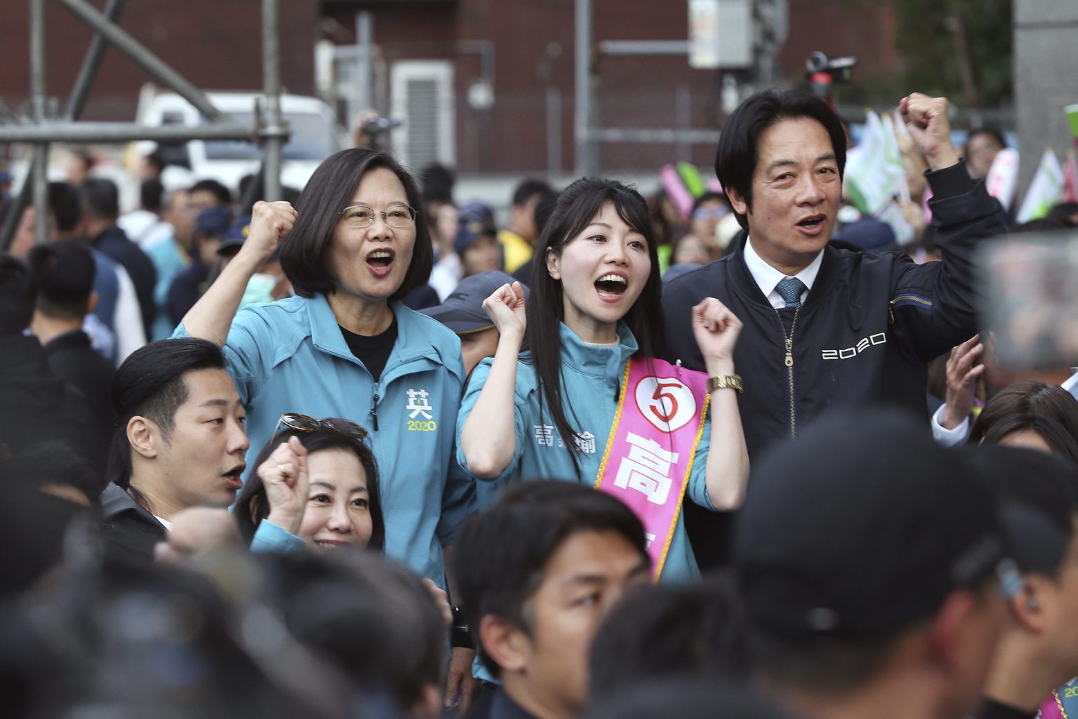 Taiwan President Tsai Ing-wen, left, presidential election candidate for the Democratic Progressive Party (DPP), and  her running mate William Lai, right, wave to the crowd from an election campaign car in Taipei, Taiwan, Friday, Jan. 10, 2020. Taiwan will hold its presidential election on Jan. 11. (AP Photo/Chiang Ying-ying)
Tsai Ing-wen,William Lai Taiwan Election