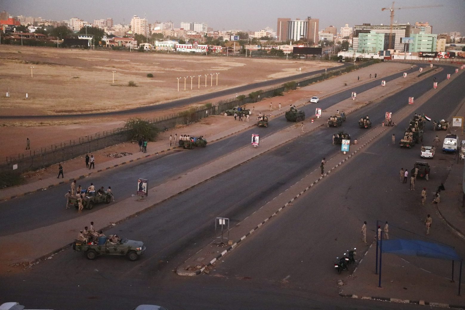 Members of the Rapid Support Forces, a paramilitary force operated by the Sudanese government, block roads in Khartoum, Sudan, Tuesday, Jan. 14, 2020. A Sudanese official said Tuesday that security forces have contained an armed protest from within the security apparatus, amid reports of unrest. (AP Photo) Sudan