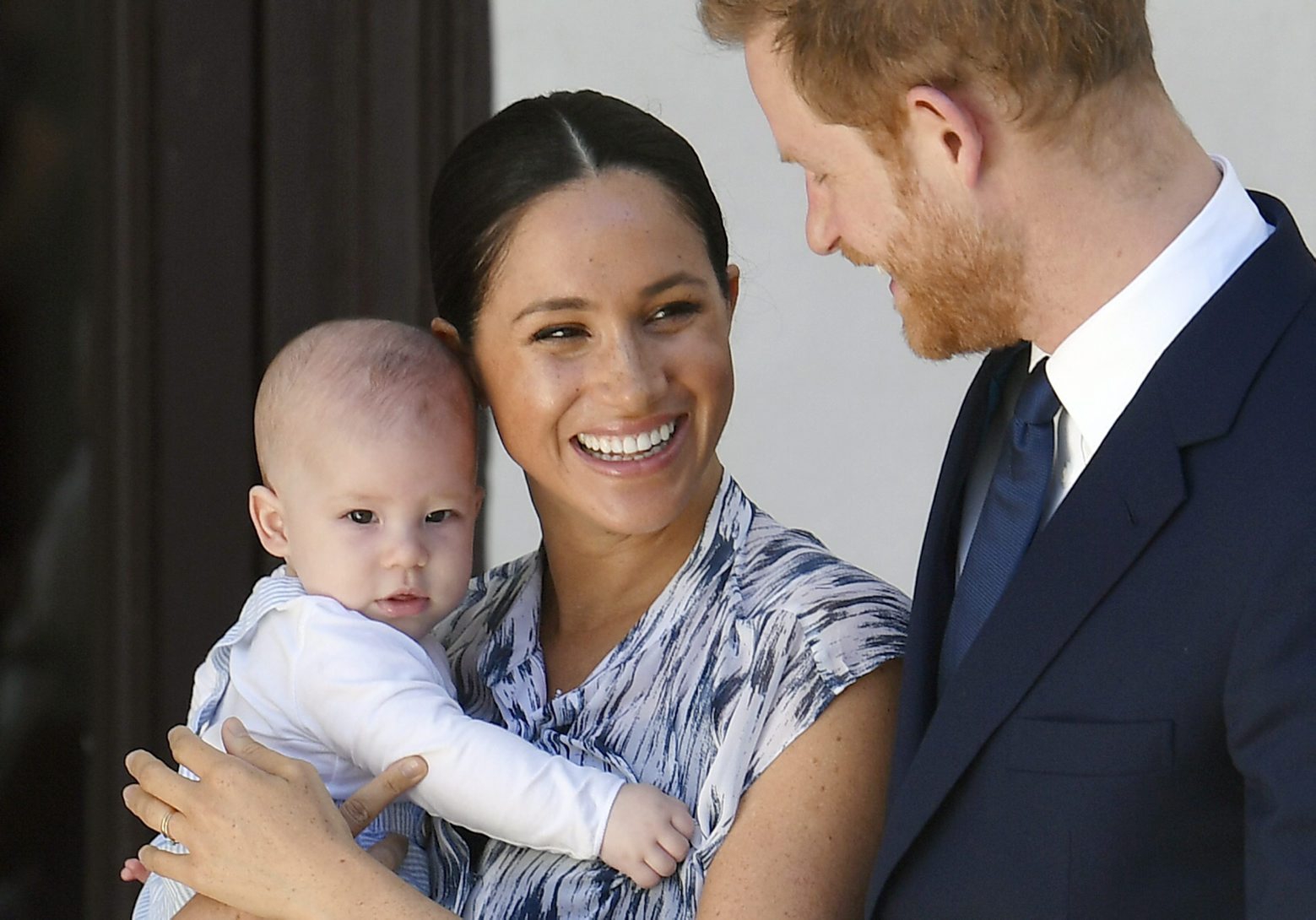 epa08139592 (FILE) - Britain's Prince Harry (R), Duke of Sussex and his wife Meghan, Duchess of Sussex, holding their son Archie, visit the Desmond & Leah Tutu Legacy Foundation in Cape Town, South Africa, 25 September 2019 (reissued 18 January 2020). Prince Harry and his wife Meghan, who in a statement on 08 January announced that they will step back as 'senior' royal family members and work to become financially independent, will no longer use their HRH titles, Buckingham Palace said in a statement on 18 January 2020. Media reports also state that the couple plans to pay back some 2.8 million euro which were payed by taxes for the renovation of their Cottage home in Britain.  EPA/TOBY MELVILLE / POOL (FILE) BRITAIN ROYALTY