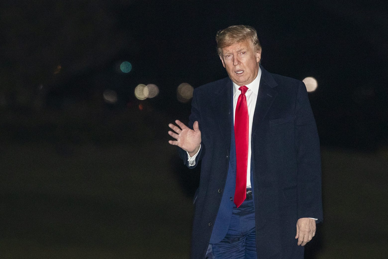 President Donald Trump waves upon arrival at the White House, Wednesday, Jan. 22, 2020, in Washington, from the World Economic Forum in Davos, Switzerland, (AP Photo/Manuel Balce Ceneta)
Donald Trump Trump