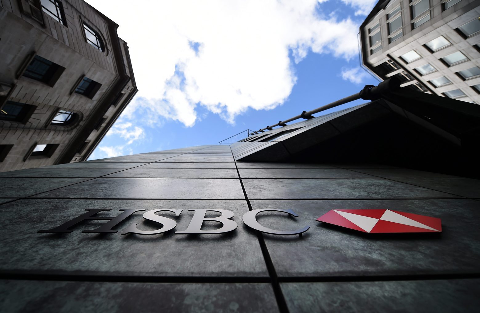 epa08225294 (FILE) - A view of a Hong Kong and Shanghai Banking Corporation (HSBC) bank branch in London, Britain, 09 June 2015 (reissued 18 February 2020). According to the bank's interim CEO Noel Quinn, HSBC is set to slash some 35,000 of its global workforce and shed around 100 billion US dollar in assets by 2022 in a major overhaul prompted by a dramatic drop in profits, which plunged by about one-third in 2019.  EPA/ANDY RAIN (FILE)  BRITAIN BANKING HSBC RESTRUCTURING
