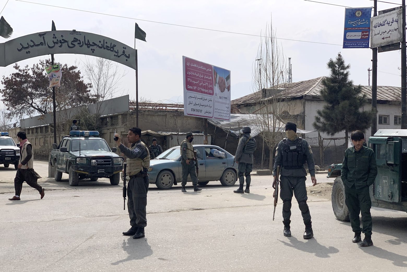 Afghan security personnel arrive at the site of an attack in Kabul, Afghanistan, Friday, March 6, 2020.  Gunmen in Afghanistan's capital of Kabul attacked a remembrance ceremony for a minority Shiite leader on Friday, wounding a dozen of people, officials said. (AP Photo/Rahmat Gul) Afghanistan