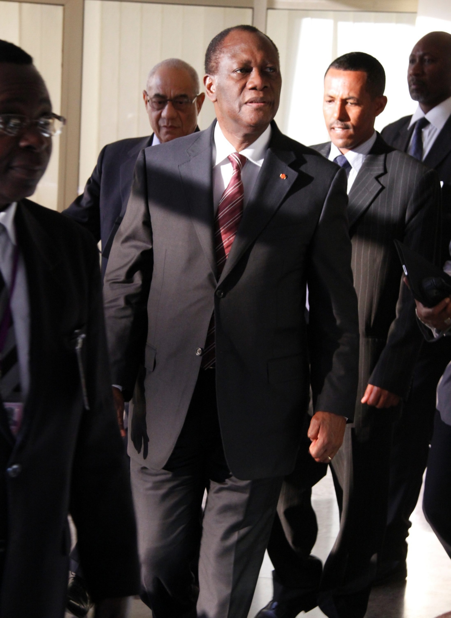 FILE - Internationally recognised Ivory Coast President Alassane Dramane Ouattara, arrives to attend the High Level Panel meeting on Ivory Coast,  at the African Union (AU) Commission headquarters in Addis Ababa, Ethiopia, in this Thursday March 10, 2011 file photo.  Fighters supporting Ouattara seized control of the country's administrative capital, Yamoussoukro on Wednesday March 30 2011. It was seen as a symbolic victory by Ouattara's forces after months of political chaos that began when Laurent Gbagbo, the incumbent president, refused to recognize the results of the November election.(AP Photo Samson Haileyesus, file ) Ethiopia Ivory Coast