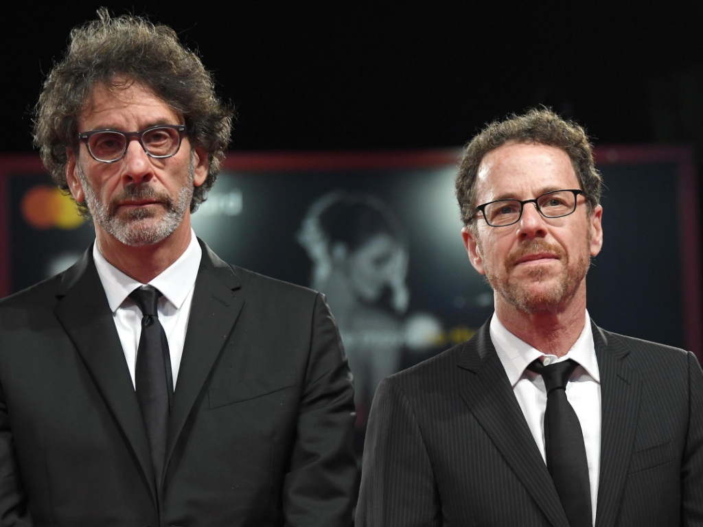 Les frères Ethan (à droite) et Joel Coen signeront le scénario de ce remake de "Scarface".