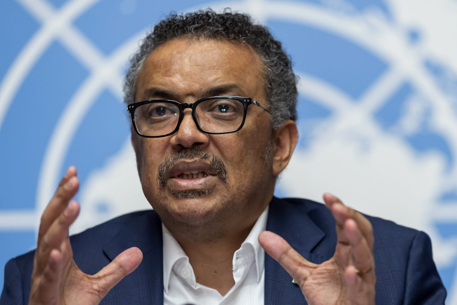 FILE-In this March 14, 2019 file photo Tedros Adhanom Ghebreyesus, Director-General of the World Health Organization (WHO), speaks at the European headquarters of the United Nations in Geneva, Switzerland. The World Health OrganizationÄôs director-general has faced many challenges during the coronavirus pandemic: racial slurs, death threats, social media caricatures Äî he was once depicted as a ventriloquistÄôs dummy in the hands of Chinese President Xi Jinping Äî and U.S. funding cuts. (Martial Trezzini/Keystone via AP) Switzerland WHO Ghebreyesus