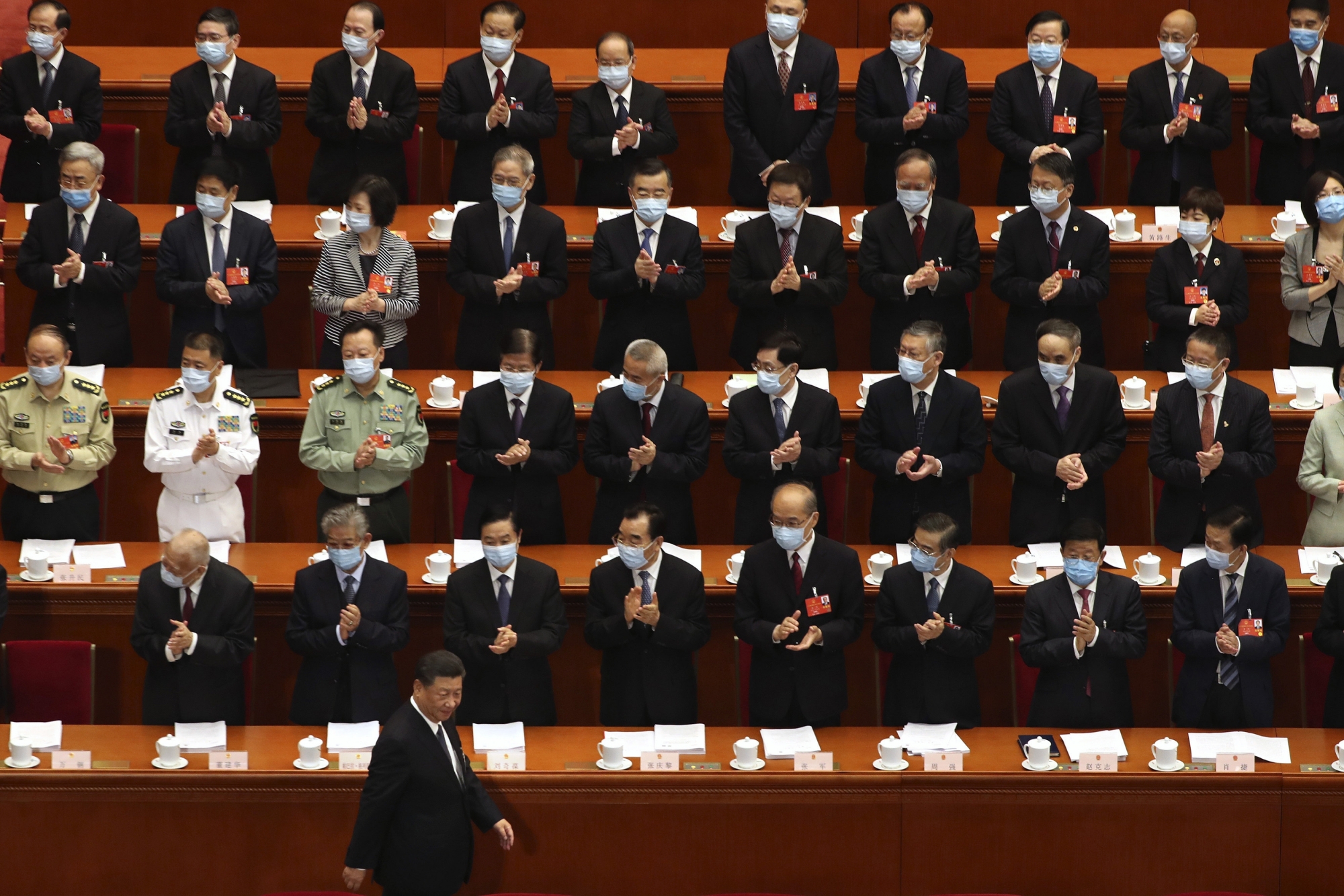 Delegates applaud as Chinese President Xi Jinping arrives for the opening session of China's National People's Congress (NPC) at the Great Hall of the People in Beijing, Friday, May 22, 2020. (AP Photo/Ng Han Guan, Pool)
Xi Jinping AP pool 12