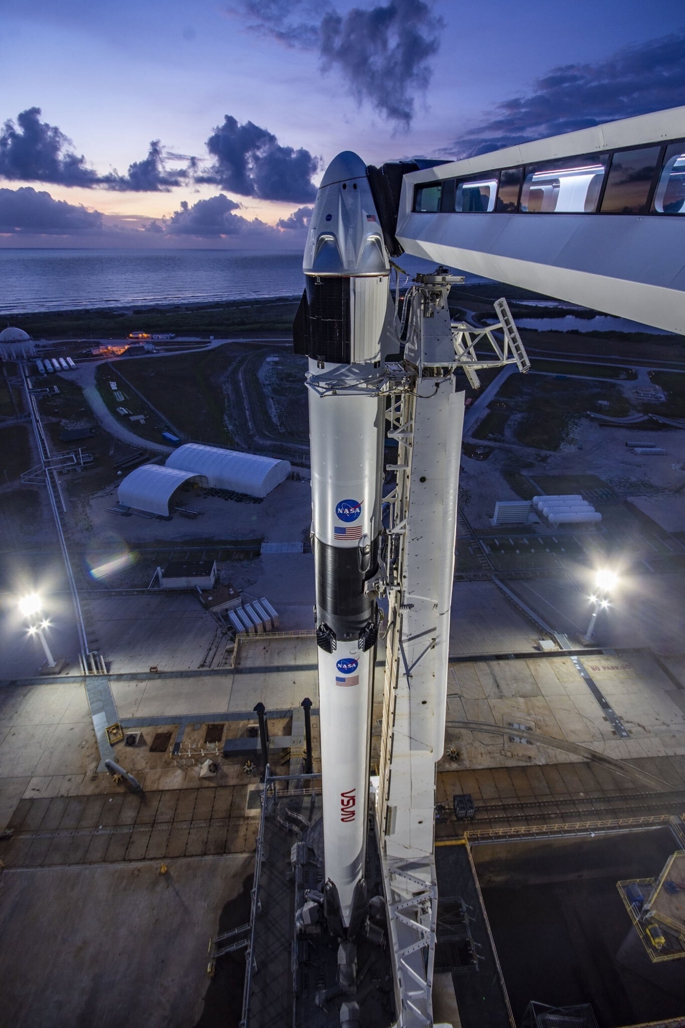 In a photo provided by SpaceX, SpaceX's Dragon crew capsule sits atop a Falcon 9 rocket Sunday morning, May 24, 2020, at Cape Canaveral, Fla. SpaceX will attempt to launch NASA astronauts Doug Hurley and Bob Behnken to the International Space Station on Wednesday â?? a first for a private company. It will be the first astronaut launch from Florida since Atlantis closed out the space shuttle program in 2011, and the first American-made capsule to carry people into orbit since the Apollo-Soyuz mission in 1975. (SpaceX via AP) Home Launch