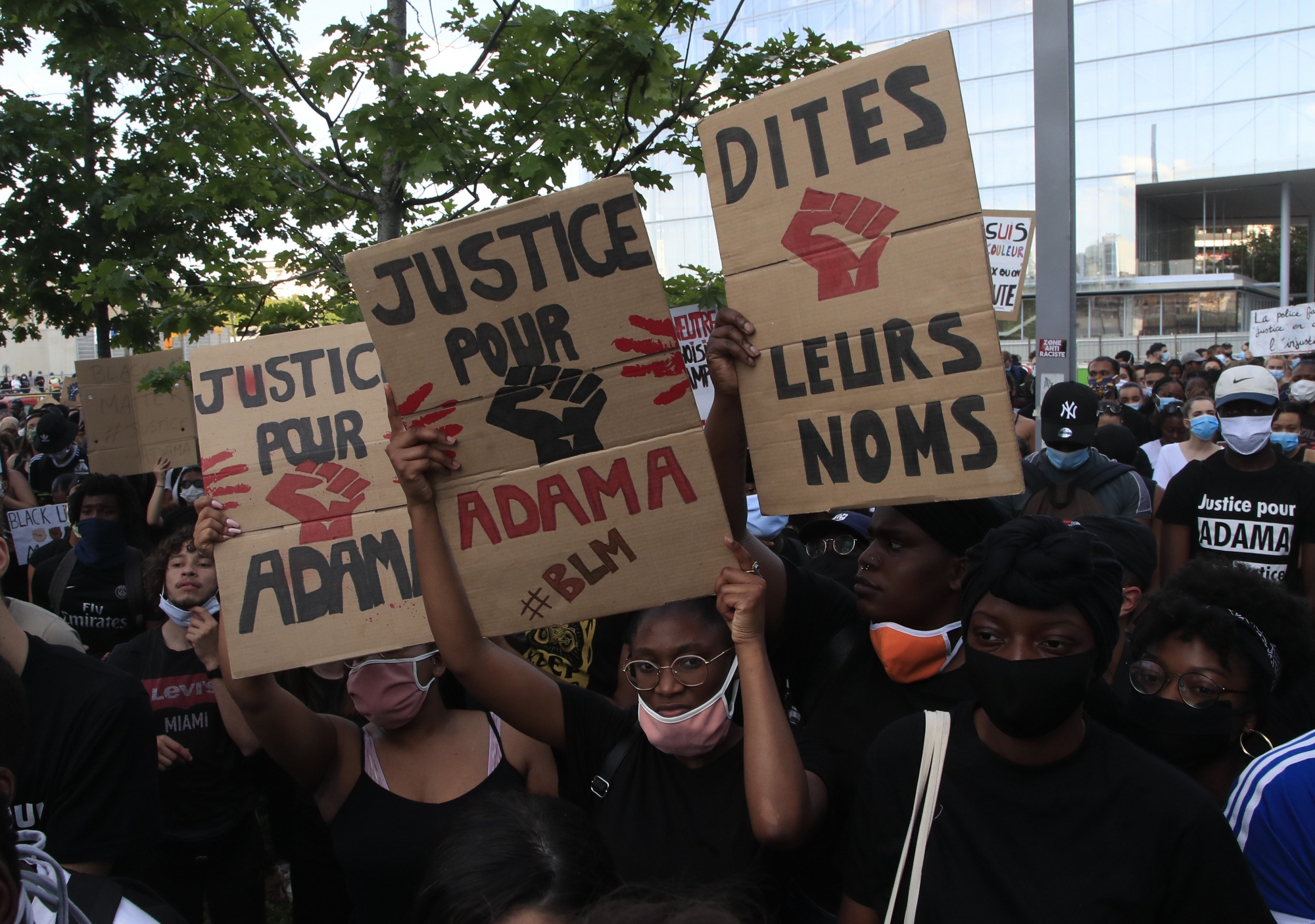 FILE - In this Tuesday, June 2, 2020 file photo people protest with posters reading "Justice for Adama" outside the Palace of Justice in Paris. The demonstrators declared "We are all George Floyd," but also invoked the name of Adama Traore, a 24-year-old Frenchman of Malian origin who died in police custody in 2016. The circumstances are still under investigation by justice authorities. (AP Photo/Michel Euler, File)
ArcInfo