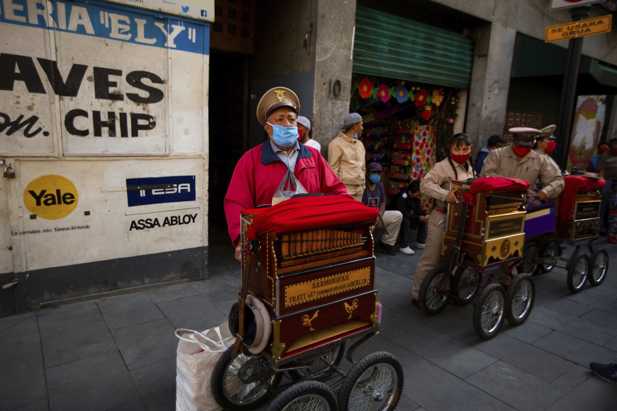 Organ grinders who make money on tips by pedestrians wait for donated groceries in Mexico City, Thursday, June 4, 2020. CADENA, a non-profit, civil organization dedicated to assisting during emergencies and disasters around the world, delivered groceries to hundreds of organ grinders who have lost their source of income due to restrictions amid the new coronavirus. (AP Photo/Fernando Llano)
Juan Antonio Salas
ArcInfo