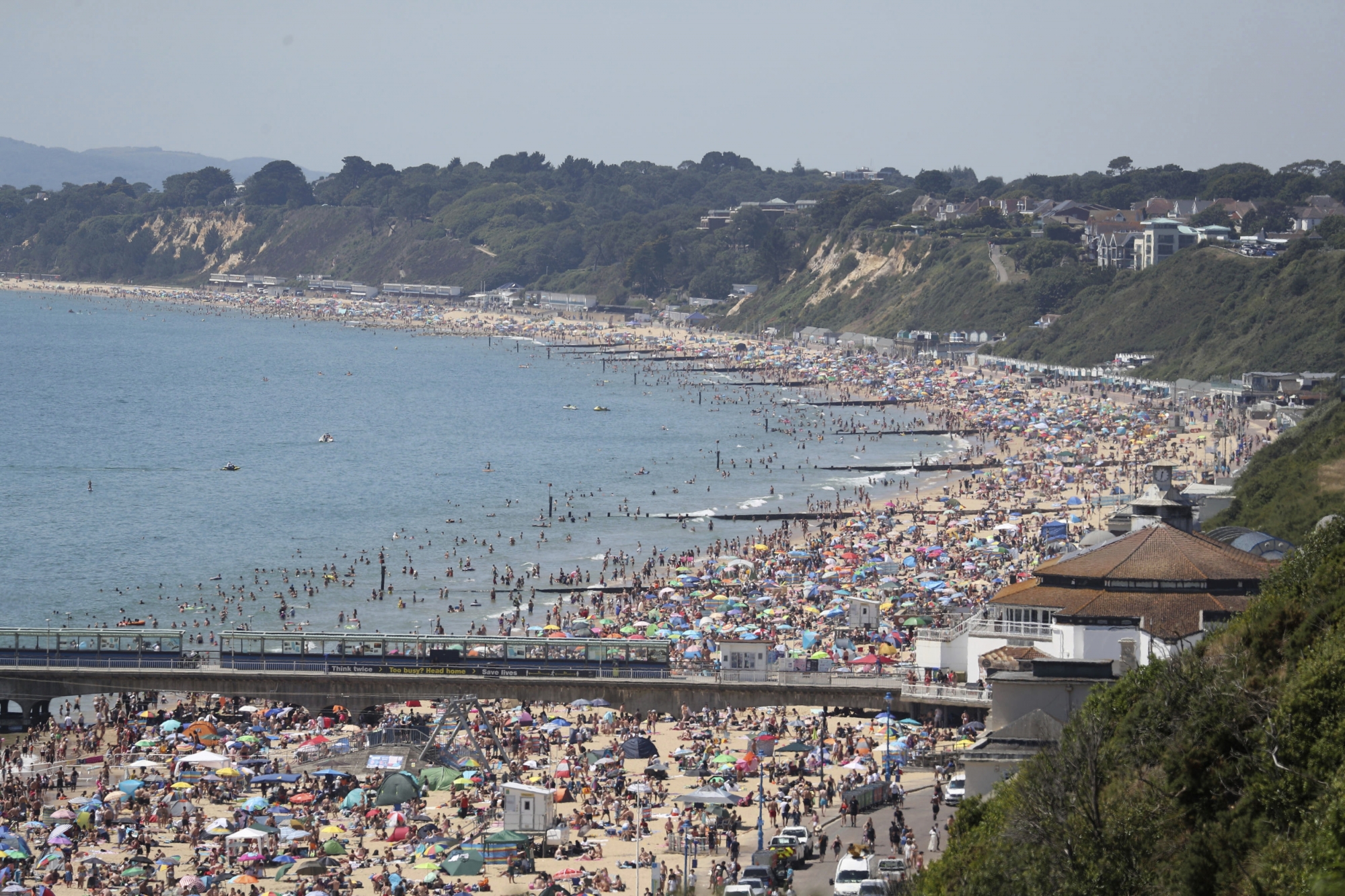 Crowds gather as hot weather draws crowds to the beach in Bournemouth, England, Thursday June 25, 2020. Coronavirus lockdown restrictions are being relaxed but people should still respect the distancing requirements between family groups. According to weather forecasters this could be the UK's hottest day of the year, so far, with scorching temperatures forecast to rise even further. (Andrew Matthews/PA via AP)
ArcInfo