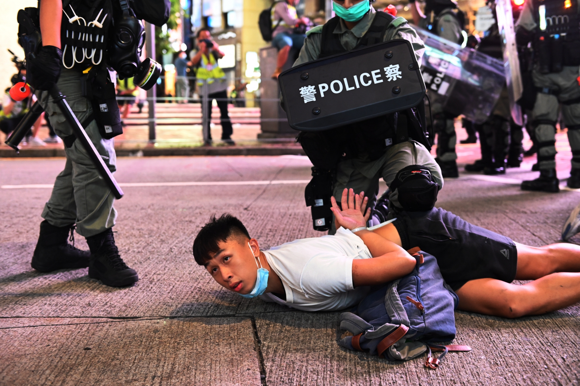 epaselect epa08520539 Police officers detain protesters during a rally against a new national security law on the 23rd anniversary of the establishment of the Hong Kong Special Administrative Region in Hong Kong, China, 01 July 2020. The new national security law, that Beijing has tailor-made for Hong Kong, prohibits acts of secession, subversion, terrorism and collusion with foreign forces to endanger national security.  EPA/MIGUEL CANDELA
ArcInfo