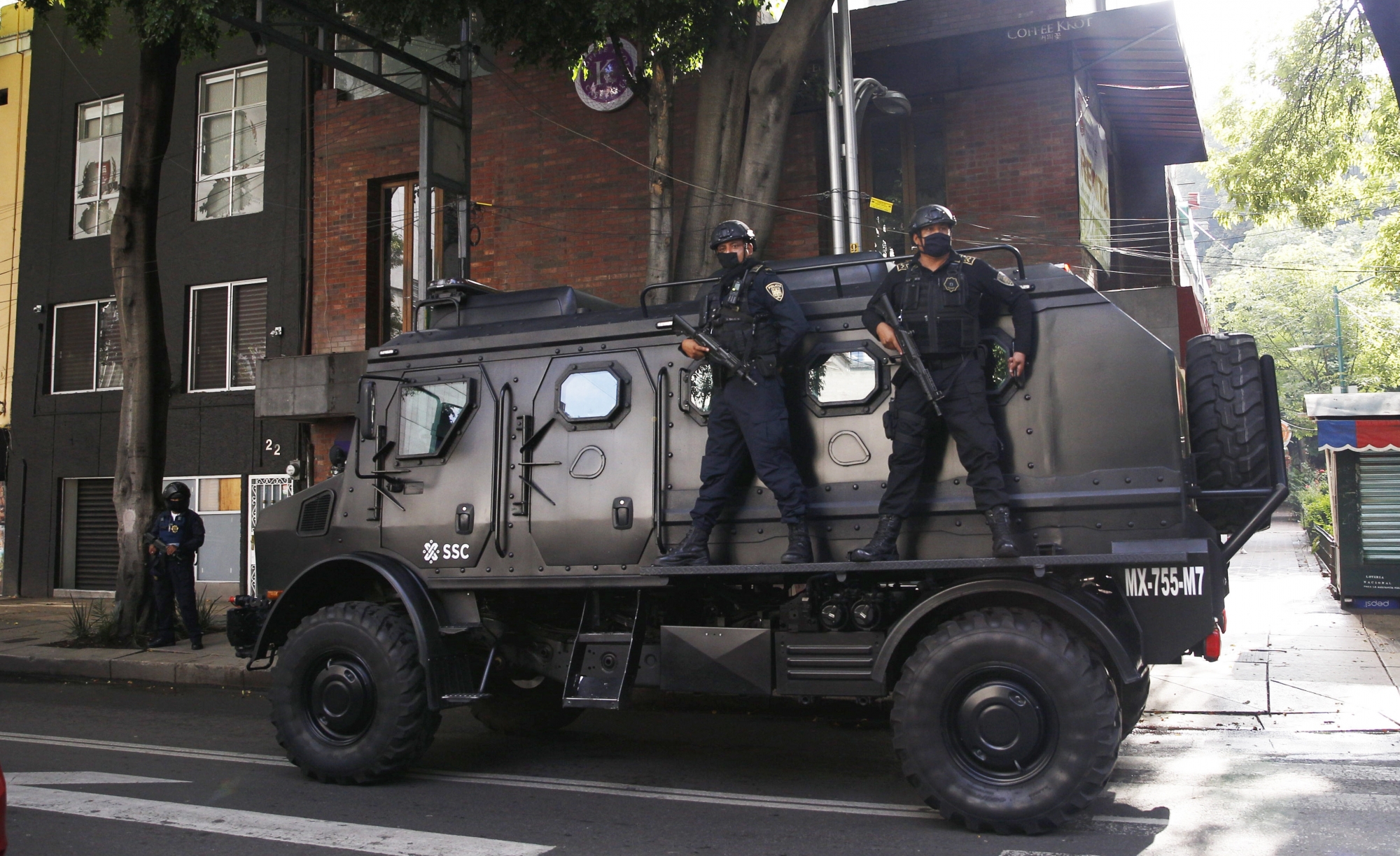 A police vehicle arrives to the place where an abandoned vehicle that is believed to have been used by gunmen in an attack against the chief of police was found, in Mexico City, Friday, June 26, 2020. Heavily armed gunmen attacked and wounded Omar Garcia Harfuch in a brazen operation that left an unspecified number of dead, Mayor Claudia Sheinbaum said Friday. (AP Photo/Marco Ugarte)
ArcInfo