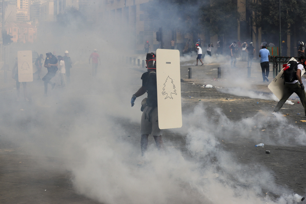 Des Libanais en colère manifestent samedi dans le centre de Beyrouth.