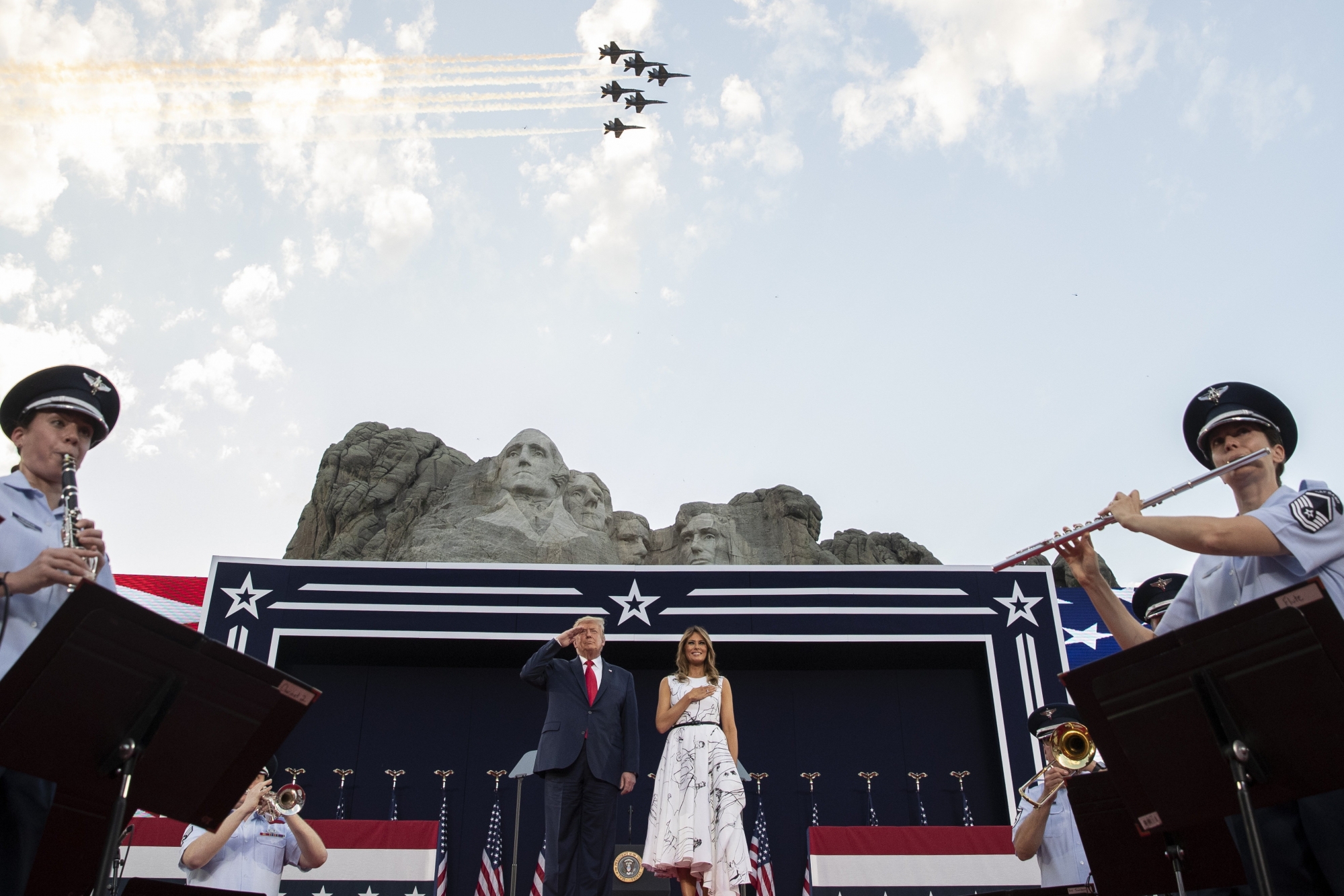 President Donald Trump, accompanied by first lady Melania Trump, stands during the national anthem with a flyover by the U.S. Navy Blue Angles at Mount Rushmore National Memorial, Friday, July 3, 2020, near Keystone, S.D. (AP Photo/Alex Brandon)
Donald Trump,Melania Trump
ArcInfo